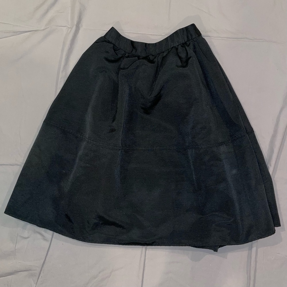 black skirt.